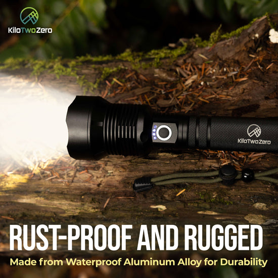 Rust-proof and durable Guardian 2.0 Flashlight on a tree log
